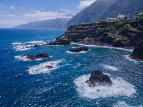 Coastal landscape with cliffs and blue sea